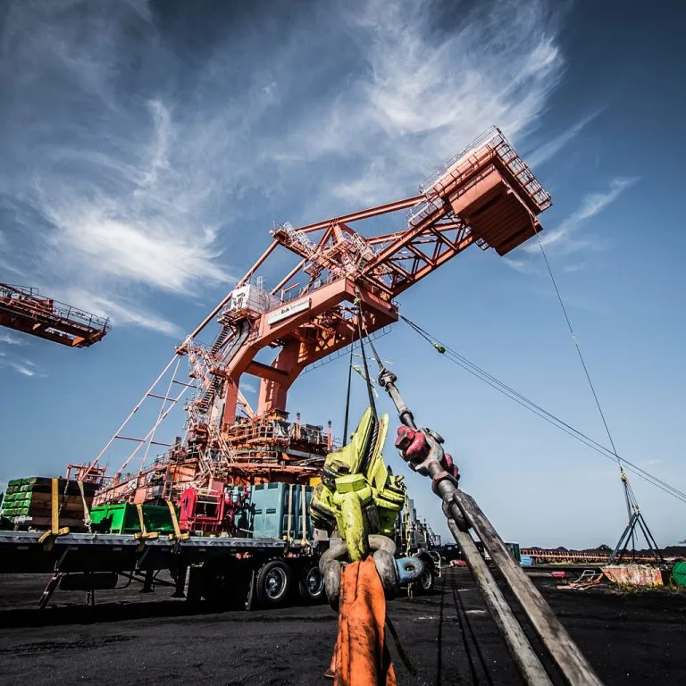 Industrial crane rigging at a millwright facility