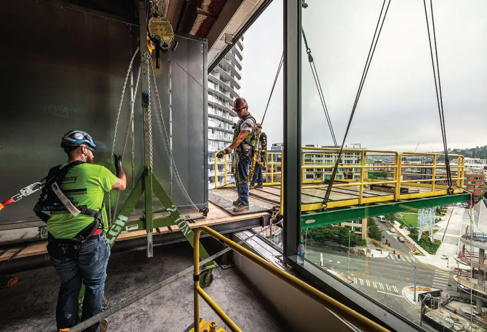 High-rise rigging operation in progress